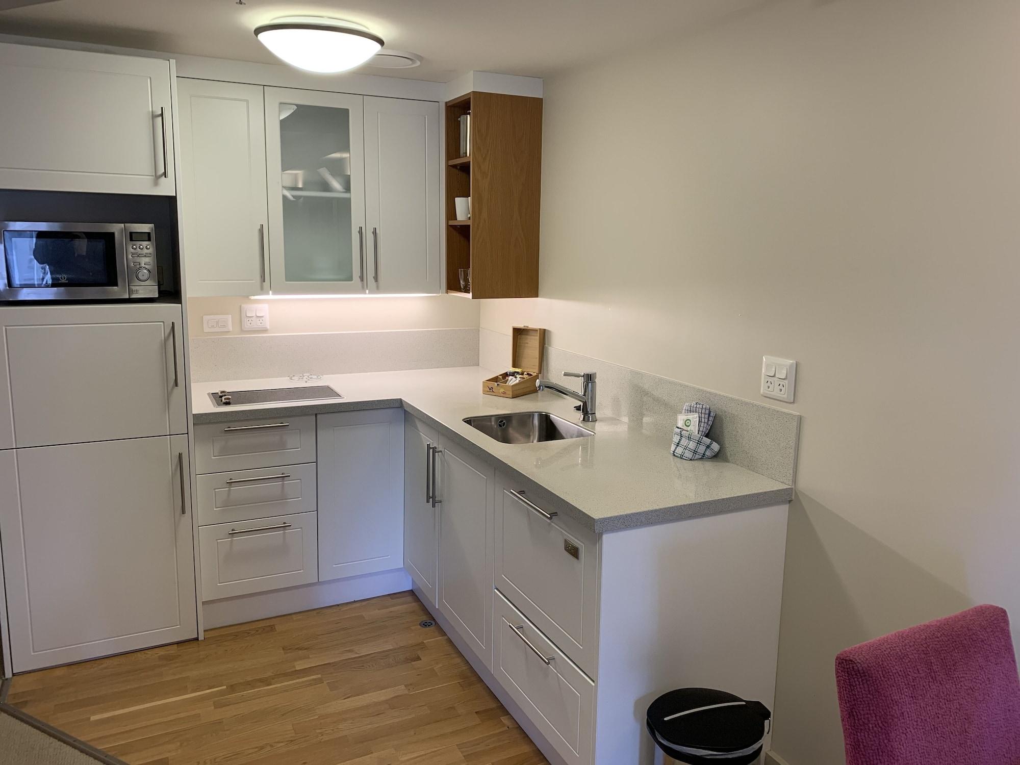 Vr Takapuna Auckland Exterior foto A typical kitchen in a student apartment